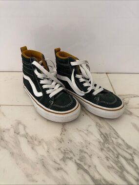 Black High-Top Sneakers with White Stripe and Mustard Interior